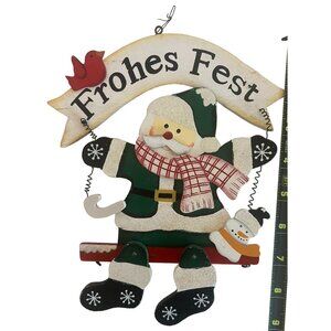 German decor Frohes Fest "Happy Holidays"  Articulated Santa on swing door hang
